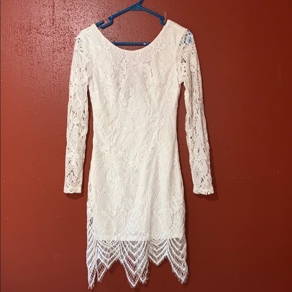 Long sleeve lace dress.